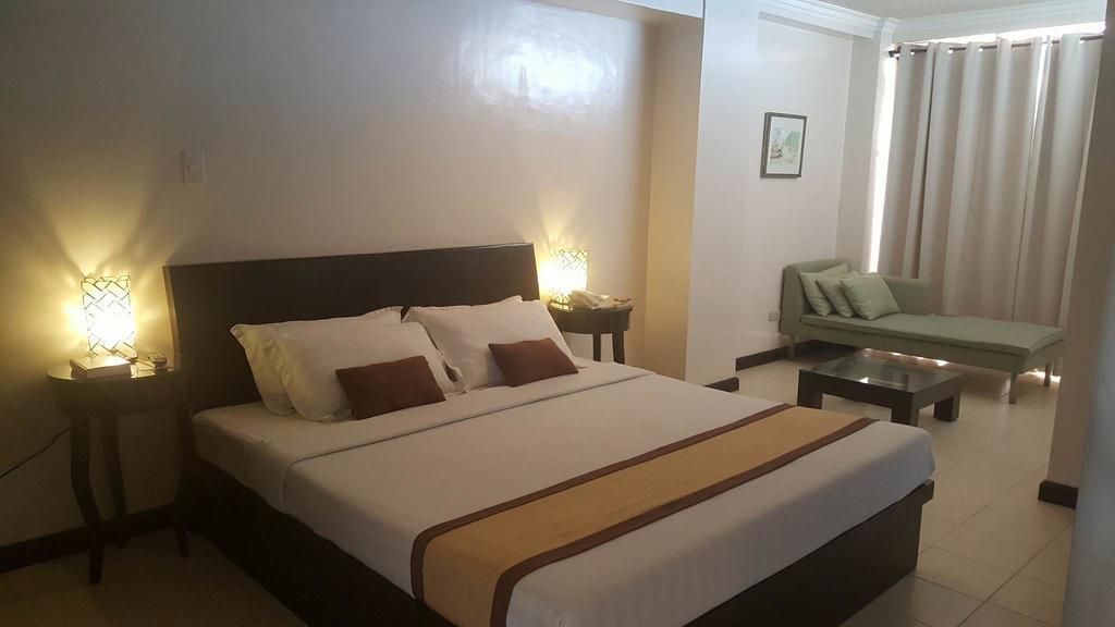 Hotel Tavern Суригао Экстерьер фото