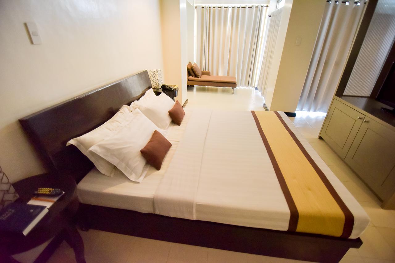 Hotel Tavern Суригао Экстерьер фото